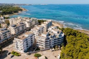 an aerial view of buildings on the beach at Appartamento Colli in Gallipoli