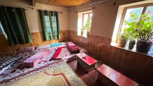 Postel nebo postele na pokoji v ubytování Darcha sumdo Homestay