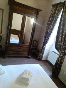 Posteľ alebo postele v izbe v ubytovaní Trulli in Martina Franca residence