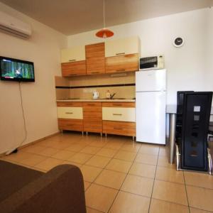 Kuchyňa alebo kuchynka v ubytovaní 4Season Apartman
