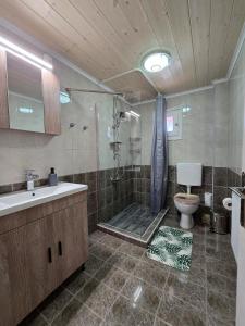 Koupelna v ubytování Diamando's Maisonette + 11 fotografií