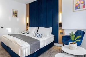 Postel nebo postele na pokoji v ubytování Hotel Soimul