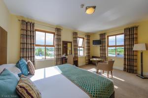 Voodi või voodid majutusasutuse Cryans Hotel toas