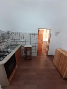 Kuchyňa alebo kuchynka v ubytovaní Trulli in Martina Franca residence