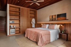 Cama ou camas em um quarto em Barracuda Boutique