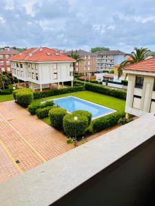Πισίνα στο ή κοντά στο Apartamento la Riberuca con piscina