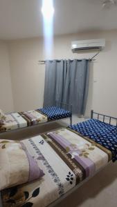 Postel nebo postele na pokoji v ubytování Gulf Gateway Hostel
