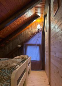 Postelja oz. postelje v sobi nastanitve Camping & Glamping Grintovec