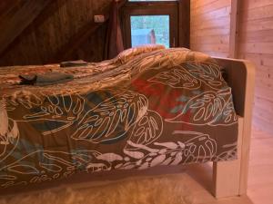 Postelja oz. postelje v sobi nastanitve Camping & Glamping Grintovec