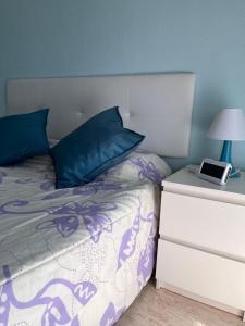 Posteľ alebo postele v izbe v ubytovaní Apartamento Family