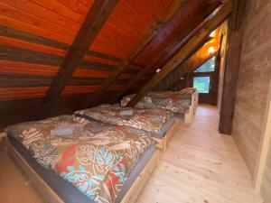Postelja oz. postelje v sobi nastanitve Camping & Glamping Grintovec
