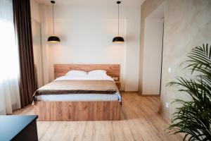 Ένα ή περισσότερα κρεβάτια σε δωμάτιο στο Stay At Georges And Fly