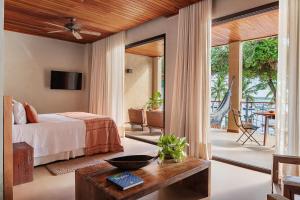 Cama ou camas em um quarto em Barracuda Boutique