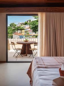 Cama ou camas em um quarto em Barracuda Boutique