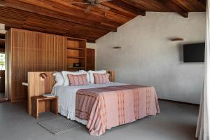 Cama ou camas em um quarto em Barracuda Boutique
