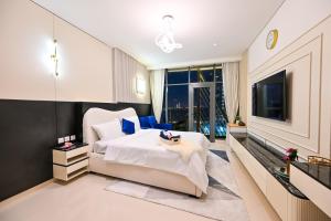 Luxury Studio - Sea View, Beach Access & Infinity Pool - Seven Palm Residences客房内的一张或多张床位