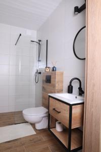 Koupelna v ubytování Apartament Przystań + 5 fotografií
