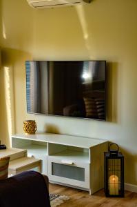 TV a/nebo společenská místnost v ubytování Apartament Przystań