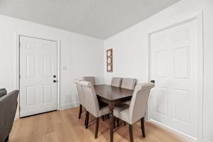 a dining room with a table and chairs at Spacious McKinney Bungalow - 4 Bedrooms in McKinney