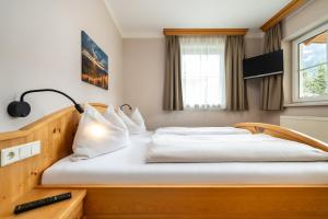 Postel nebo postele na pokoji v ubytování Haus am Hammerrain
