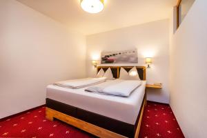 Postel nebo postele na pokoji v ubytování Haus am Hammerrain