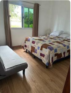 Postel nebo postele na pokoji v ubytování Villas San Francisco, Siguatepeque, Comayagua + 11 fotografií