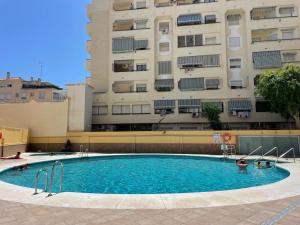 Bazén v ubytovaní Cozy Holiday Studio Palmeras - WiFi, AC, Pool alebo v jeho blízkosti