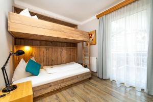 Postel nebo postele na pokoji v ubytování Haus am Hammerrain