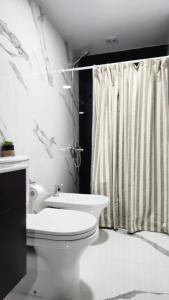 Koupelna v ubytování Caleta Design Departamento frente al mar + 8 fotografií