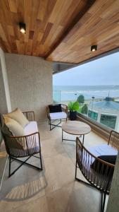 Posezení v ubytování Caleta Design Departamento frente al mar