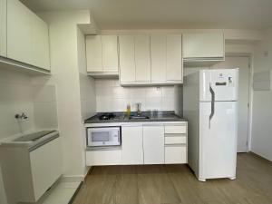 Η κουζίνα ή μικρή κουζίνα στο Apartamento 1212
