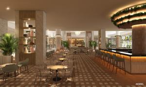 ein Restaurant mit Tischen und Stühlen und eine Bar in der Unterkunft Riu Ventura - All Inclusive in Cancún