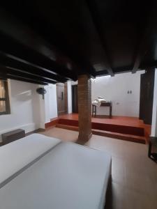 Ένα ή περισσότερα κρεβάτια σε δωμάτιο στο The Nest An Heritage House +14 φωτογραφίες