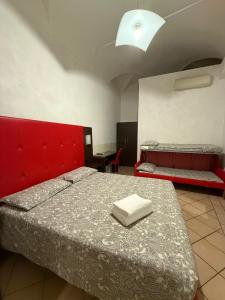 Posteľ alebo postele v izbe v ubytovaní Sakura Inn Sanremo + 3 fotografie
