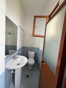 Koupelna v ubytování Begaj Rooms