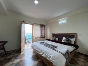 Voodi või voodid majutusasutuse GONPO Hotel toas