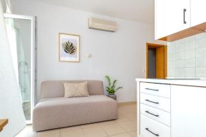 Kuchyň nebo kuchyňský kout v ubytování Sea View Apartments Tihi II