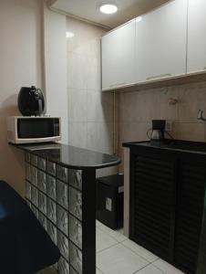 Una cocina o cocineta en Apartamento com vista incrível no Centro histórico do Rio