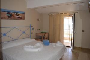 Voodi või voodid majutusasutuse Hotel Mar & Sol toas
