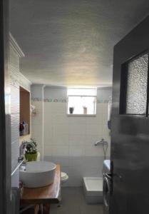 Ένα μπάνιο στο Serenity apartment chania city centre