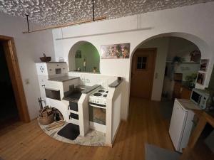 a kitchen with a toy stove in a room at Ferienwohnung Mariana in Bad Ischl