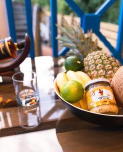a bowl of fruit on top of a table at Domaine Yacinthe in Le Robert