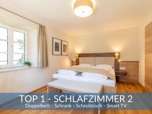 Posteľ alebo postele v izbe v ubytovaní Heimathaus Dengg - Ferienwohnungen - Sommerfrische in den Alpen