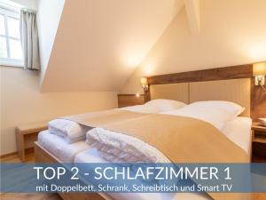 Posteľ alebo postele v izbe v ubytovaní Heimathaus Dengg - Ferienwohnungen - Sommerfrische in den Alpen