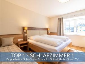 Posteľ alebo postele v izbe v ubytovaní Heimathaus Dengg - Ferienwohnungen - Sommerfrische in den Alpen