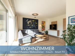 Televízia a/alebo spoločenská miestnosť v ubytovaní Heimathaus Dengg - Ferienwohnungen - Sommerfrische in den Alpen