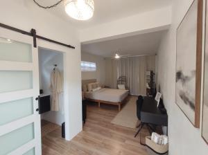 Postel nebo postele na pokoji v ubytování LittleLux Living