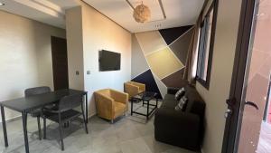 تلفاز و/أو أجهزة ترفيهية في Appartement 3 vue sur mer