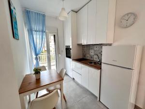Kuchyňa alebo kuchynka v ubytovaní Sea Pleasure Apartment II