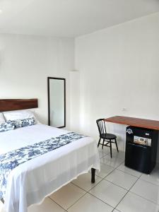 Ένα ή περισσότερα κρεβάτια σε δωμάτιο στο The Gardens +16 φωτογραφίες